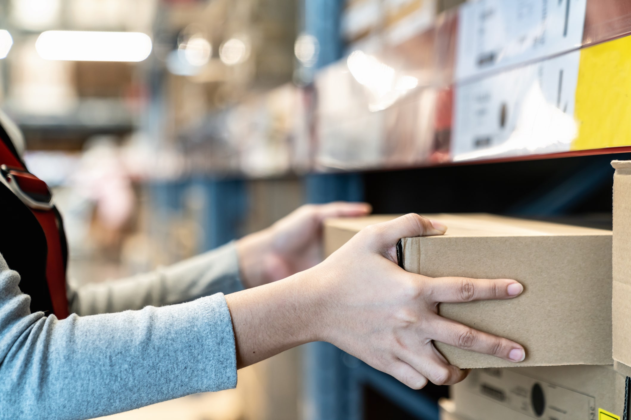 Woman Shelving Inventory